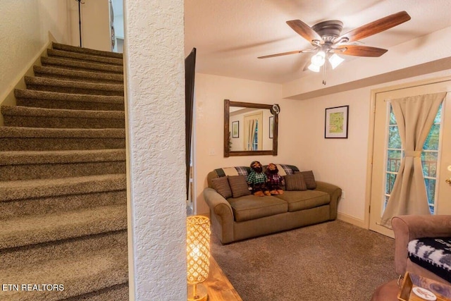 541 Johnson Ln Unit 2, Gatlinburg, TN 37738 - carpeted living area featuring stairs and ceiling fan