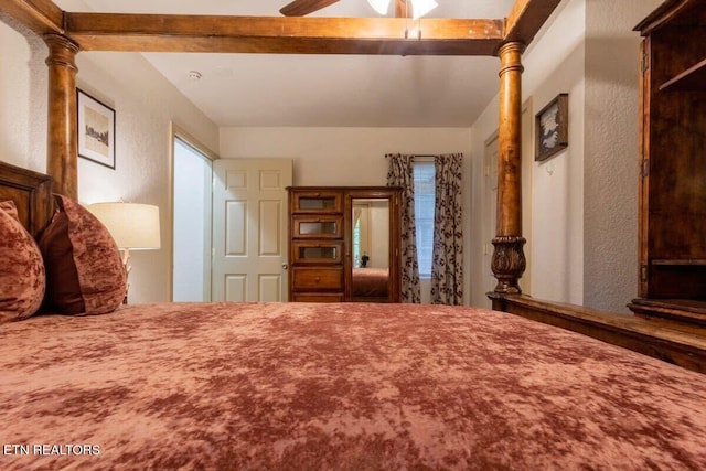 541 Johnson Ln Unit 2, Gatlinburg, TN 37738 - bedroom featuring a textured wall and ceiling fan