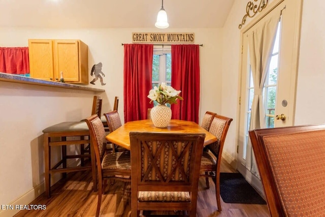 541 Johnson Ln Unit 2, Gatlinburg, TN 37738 - dining space featuring wood finished floors and vaulted ceiling