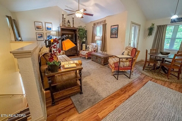 541 Johnson Ln Unit 1 & 2, Gatlinburg, TN 37738 - living room with vaulted ceiling, light wood-type flooring, a ceiling fan, and a fireplace