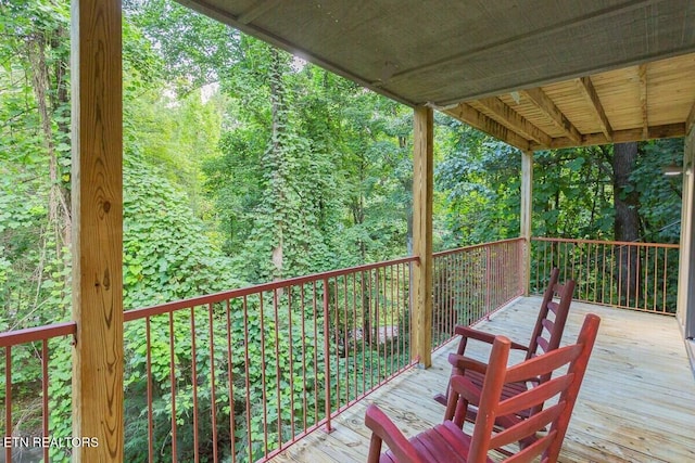 516 Proffitt Rd Unit 2, Gatlinburg, TN 37738 - wooden terrace with a forest view