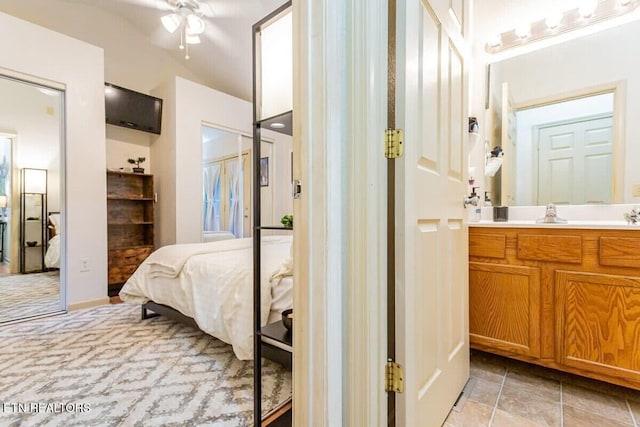 516 Proffitt Rd Unit 2, Gatlinburg, TN 37738 - bathroom featuring a ceiling fan, vanity, and ensuite bath