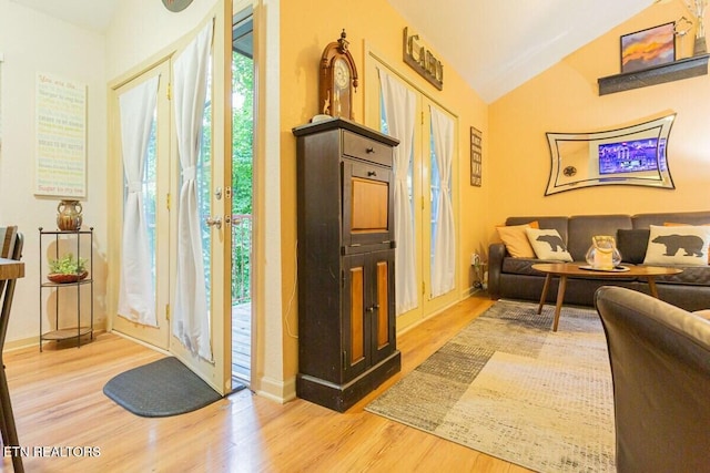 516 Proffitt Rd Unit 2, Gatlinburg, TN 37738 - foyer featuring light wood-style floors and vaulted ceiling