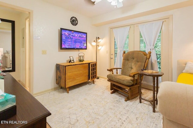 516 Proffitt Rd Unit 2, Gatlinburg, TN 37738 - living area with a ceiling fan and baseboards
