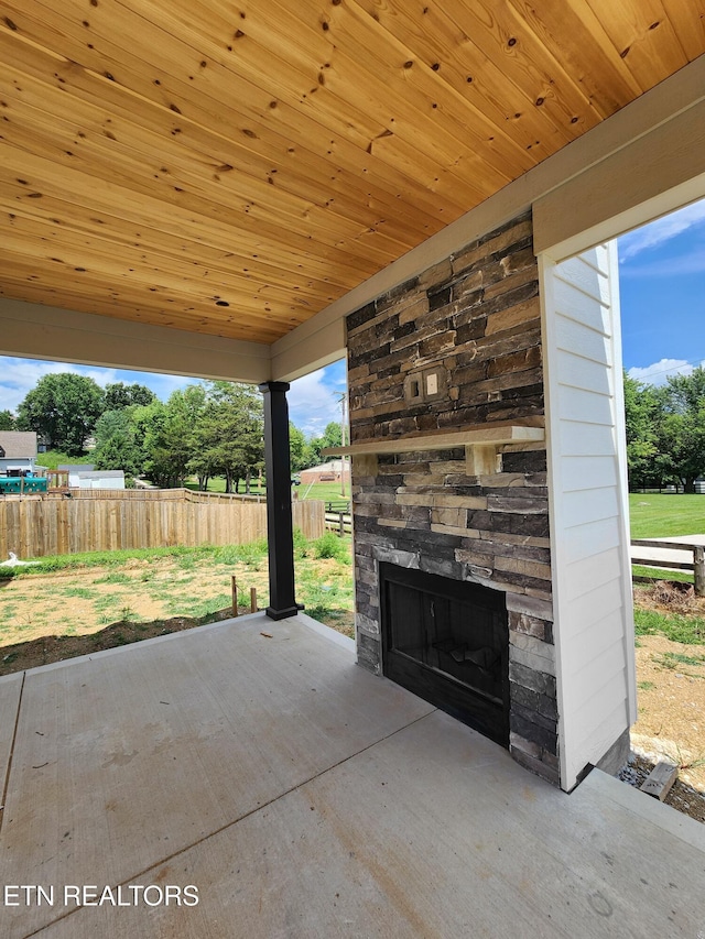 124 Chelsea Ln, Lafollette, TN 37766 - view of patio featuring an outdoor stone fireplace