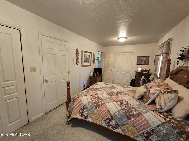 340 Machine Branch Rd, Ewing, VA 24248 - carpeted bedroom featuring a textured ceiling and a closet
