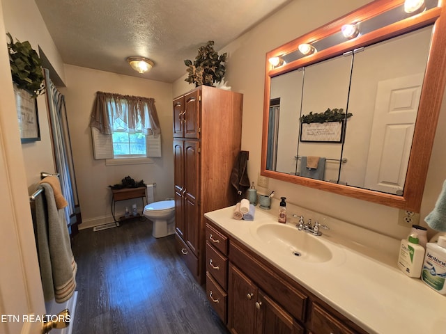 340 Machine Branch Rd, Ewing, VA 24248 - full bathroom featuring vanity, wood finished floors, and a textured ceiling