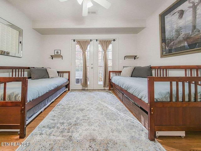 516 Proffitt Rd Unit 1 & 2, Gatlinburg, TN 37738 - bedroom featuring access to exterior, wood finished floors, french doors, and ceiling fan