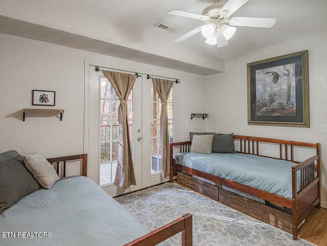 516 Proffitt Rd Unit 1 & 2, Gatlinburg, TN 37738 - bedroom featuring access to outside, multiple windows, wood finished floors, and ceiling fan