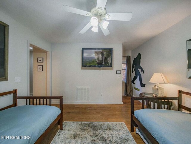 516 Proffitt Rd Unit 1 & 2, Gatlinburg, TN 37738 - bedroom with wood finished floors and a ceiling fan