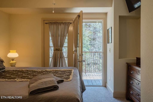 520 Proffitt Rd Unit 1, Gatlinburg, TN 37738 - carpeted bedroom featuring access to outside and baseboards
