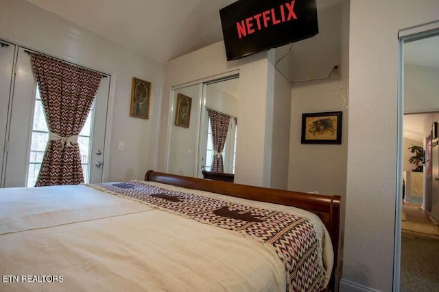 520 Proffitt Rd Unit 1, Gatlinburg, TN 37738 - bedroom featuring a closet and vaulted ceiling