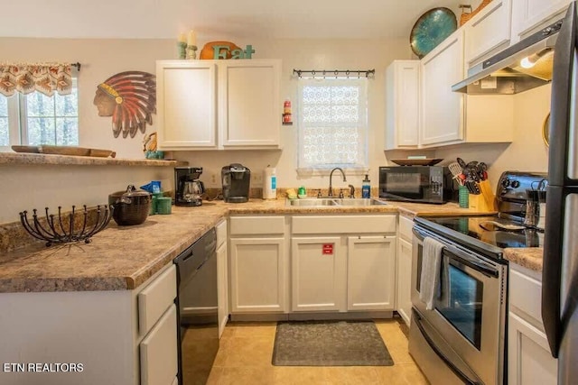 520 Proffitt Rd Unit 1, Gatlinburg, TN 37738 - kitchen featuring black appliances, under cabinet range hood, healthy amount of natural light, and light tile patterned flooring