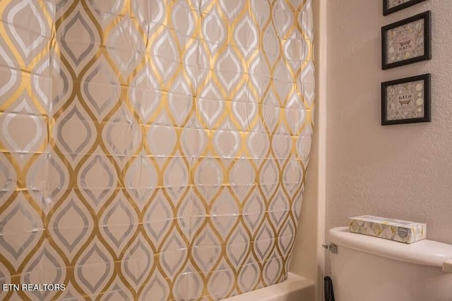 520 Proffitt Rd Unit 1, Gatlinburg, TN 37738 - bathroom featuring toilet and shower / bath combination with curtain