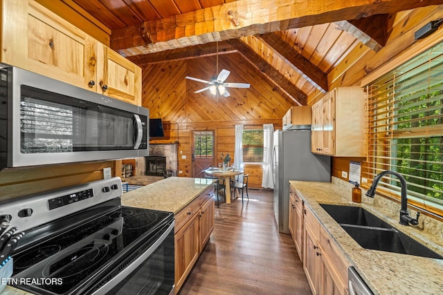 4372 Boogertown Rd Unit 2, Sevierville, TN 37876 - kitchen featuring appliances with stainless steel finishes, wooden ceiling, dark wood-style floors, light brown cabinetry, and wooden walls