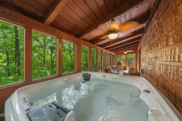 4372 Boogertown Rd Unit 2, Sevierville, TN 37876 - unfurnished sunroom with a jacuzzi and ceiling fan