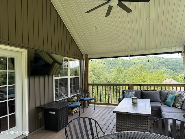 667 Pine Hollow Rd, Jacksboro, TN 37757 - deck with an outdoor living space and a ceiling fan