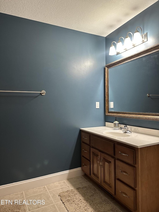 667 Pine Hollow Rd, Jacksboro, TN 37757 - bathroom with vanity, tile patterned flooring, and a textured ceiling