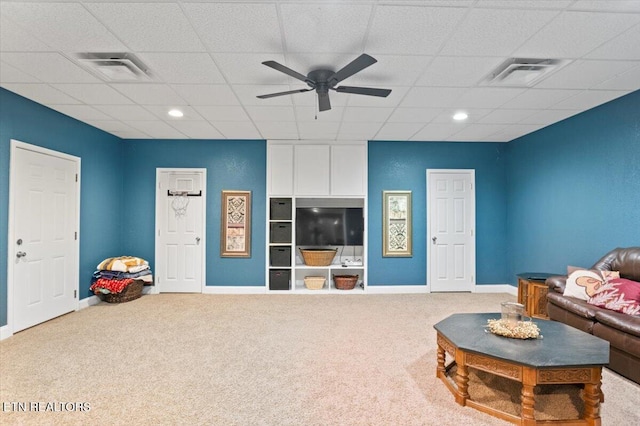 667 Pine Hollow Rd, Jacksboro, TN 37757 - carpeted living area with a ceiling fan and a drop ceiling