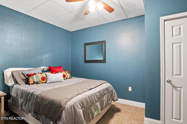667 Pine Hollow Rd, Jacksboro, TN 37757 - carpeted bedroom featuring a paneled ceiling, a textured wall, and ceiling fan