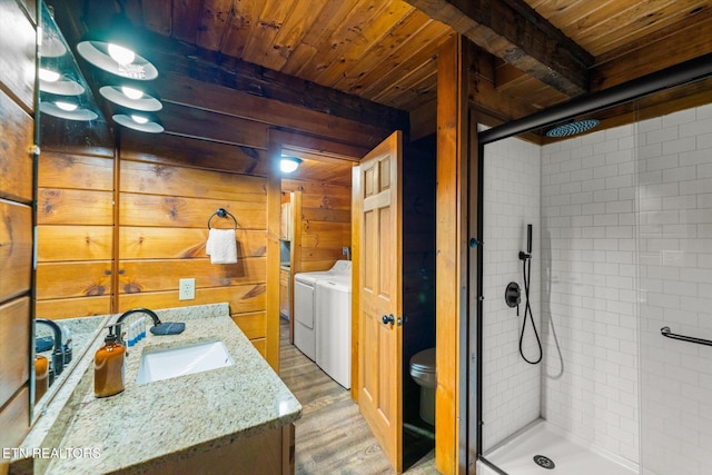 4372 Boogertown Rd Unit 4, Sevierville, TN 37876 - bathroom featuring a shower stall, vanity, wood ceiling, wood finished floors, and wooden walls