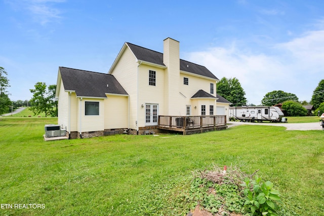 201 Locust Dr, Lafollette, TN 37766 - back of house with a deck, crawl space, a garage, a chimney, and a yard