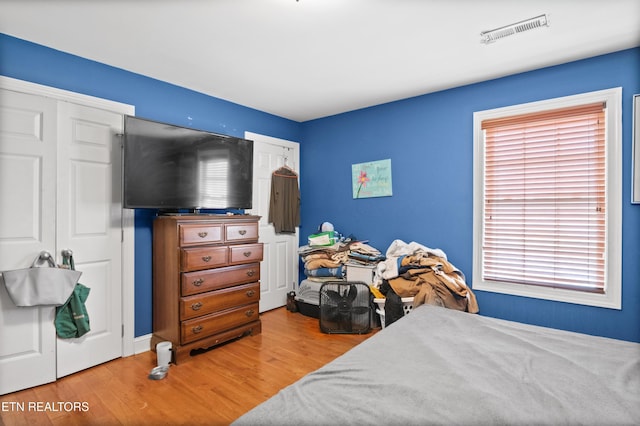 201 Locust Dr, Lafollette, TN 37766 - bedroom featuring wood finished floors