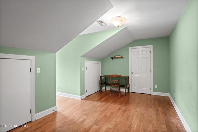 201 Locust Dr, Lafollette, TN 37766 - additional living space featuring lofted ceiling and light wood-style floors