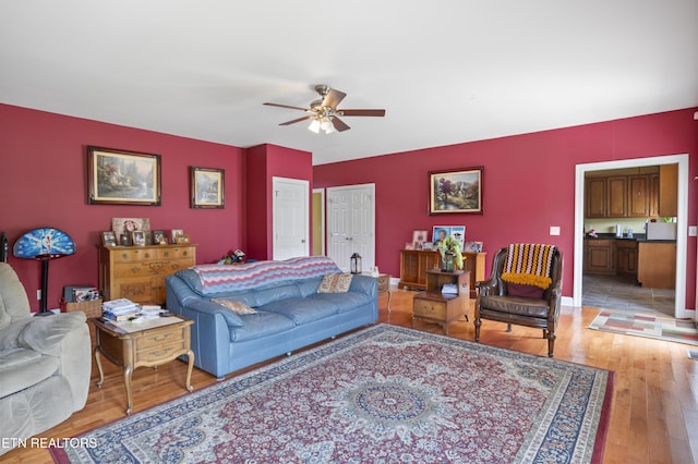 201 Locust Dr, Lafollette, TN 37766 - living room featuring ceiling fan and light wood-style flooring
