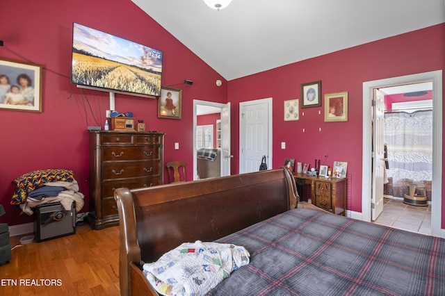 201 Locust Dr, Lafollette, TN 37766 - bedroom featuring vaulted ceiling and ensuite bathroom