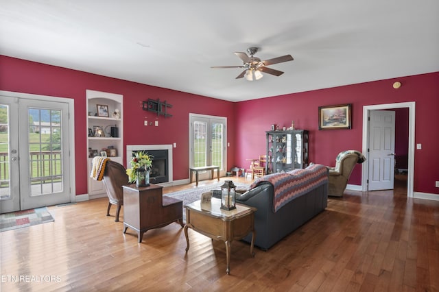 201 Locust Dr, Lafollette, TN 37766 - living room with a ceiling fan, wood-type flooring, and plenty of natural light