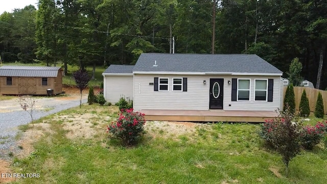 229 Ridge Top Cir, Sunbright, TN 37872 - ranch-style house featuring a storage unit