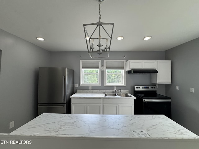 229 Ridge Top Cir, Sunbright, TN 37872 - kitchen with freestanding refrigerator, electric stove, under cabinet range hood, white cabinets, and recessed lighting