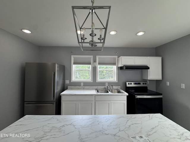 229 Ridge Top Cir, Sunbright, TN 37872 - kitchen featuring freestanding refrigerator, electric range oven, a chandelier, white cabinetry, and recessed lighting