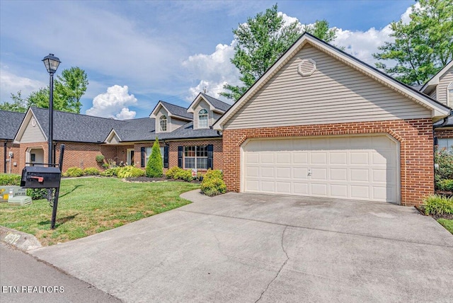 4802 Beverly Field Way, Knoxville, TN 37918 - view of front of property featuring brick siding, driveway, a front lawn, and a garage