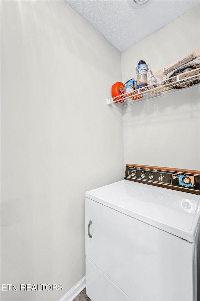 4802 Beverly Field Way, Knoxville, TN 37918 - laundry area featuring washer / clothes dryer and a textured ceiling