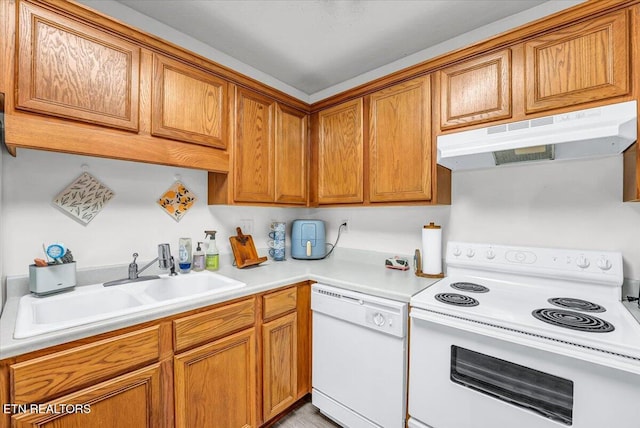 4802 Beverly Field Way, Knoxville, TN 37918 - kitchen with white appliances, under cabinet range hood, brown cabinets, and light countertops