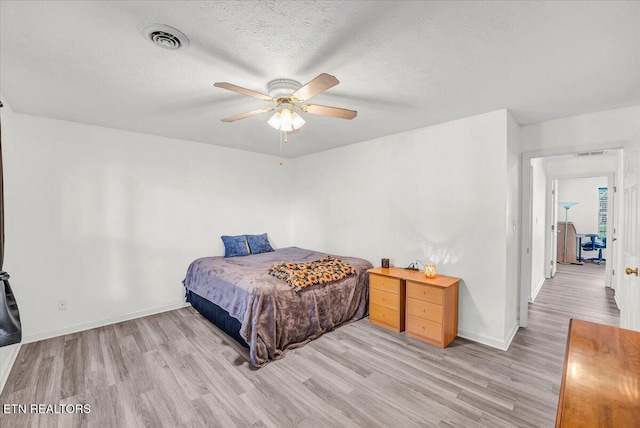 4802 Beverly Field Way, Knoxville, TN 37918 - bedroom featuring light wood-type flooring, a textured ceiling, and ceiling fan