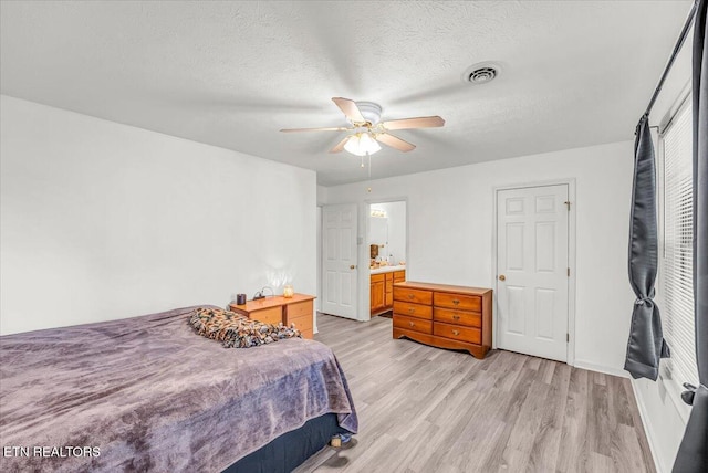 4802 Beverly Field Way, Knoxville, TN 37918 - bedroom with light wood finished floors, a textured ceiling, and a ceiling fan