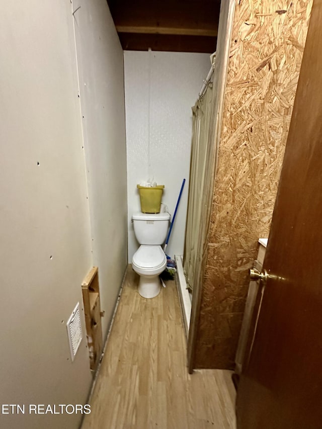 1855 Catoosa Rd, Wartburg, TN 37887 - bathroom featuring wood finished floors, a shower with shower curtain, and vanity