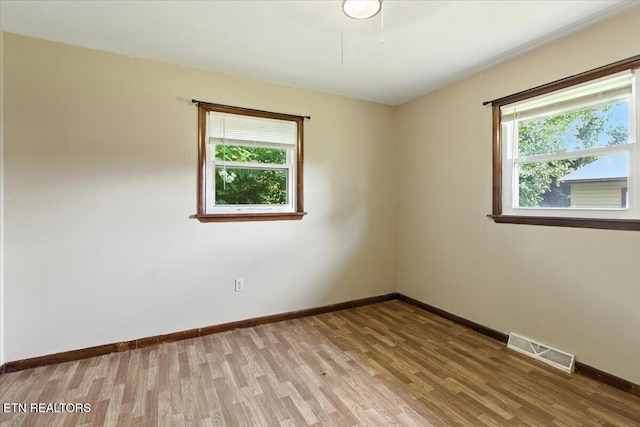 428 Wilderness Rd, Middlesboro, KY 40965 - empty room with wood finished floors and baseboards