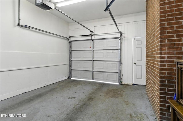 428 Wilderness Rd, Middlesboro, KY 40965 - garage with a garage door opener and baseboards