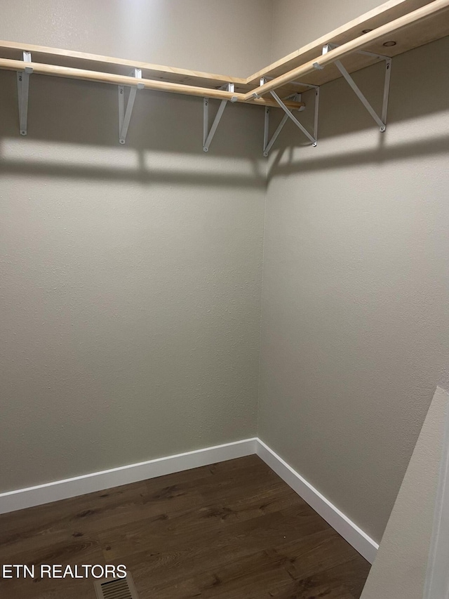 1112 Whispering Pine Ln, Jamestown, TN 38556 - walk in closet featuring dark wood-style floors