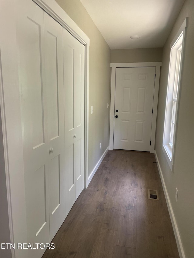 1112 Whispering Pine Ln, Jamestown, TN 38556 - doorway to outside featuring dark wood finished floors and baseboards