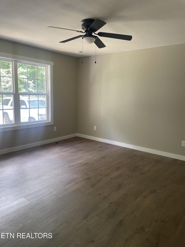 1112 Whispering Pine Ln, Jamestown, TN 38556 - spare room featuring dark wood-type flooring and ceiling fan