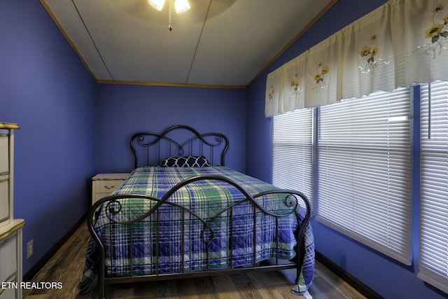1872 Mitchell Farm Rd, Sevierville, TN 37876 - bedroom featuring wood finished floors and vaulted ceiling