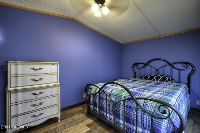 1872 Mitchell Farm Rd, Sevierville, TN 37876 - bedroom with lofted ceiling, wood finished floors, ceiling fan, and ornamental molding