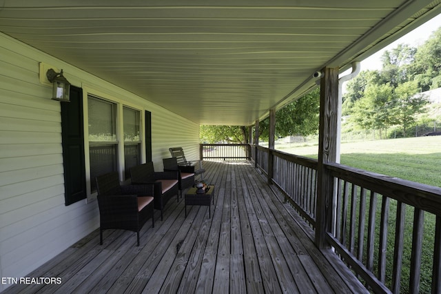 1872 Mitchell Farm Rd, Sevierville, TN 37876 - deck with an outdoor living space and a lawn