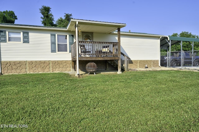 1872 Mitchell Farm Rd, Sevierville, TN 37876 - rear view of house featuring a deck and a carport