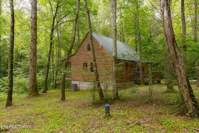 861 Windy Hill Way, Cosby, TN 37722 - view of side of property with log veneer siding, a view of trees, and a metal roof